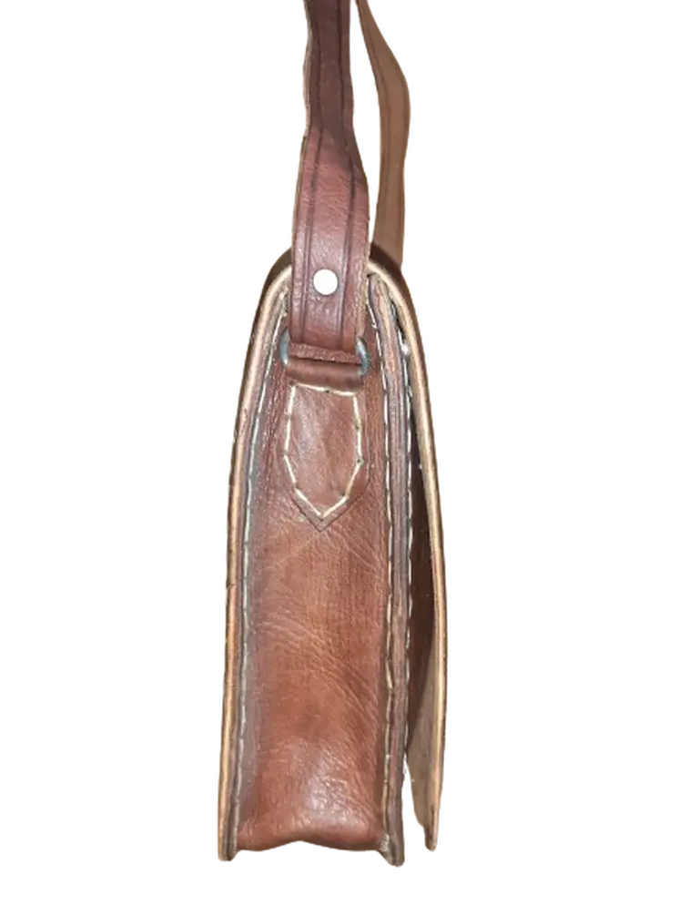 Bolso cuadrado vacuno calado