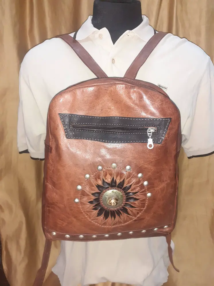 Mochila colegial sol piedra de colores