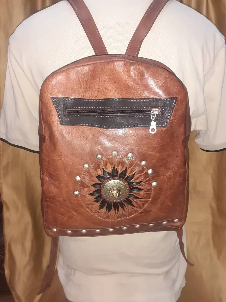 Mochila colegial sol piedra de colores