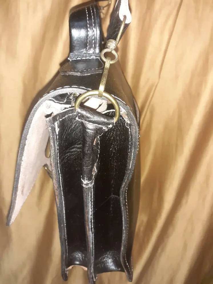 Bolso fez mariconera asa doble