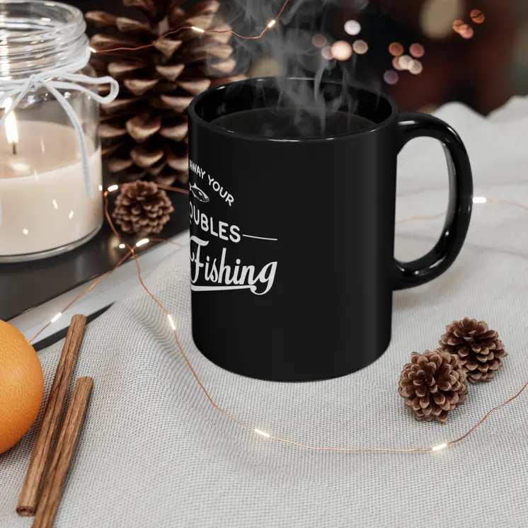 Cast away your Troubles Go Fishing - 11oz Black Mug