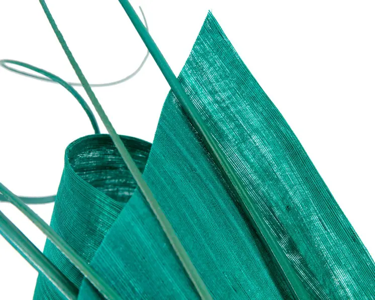 Edgy teal green fascinator by Fillies Collection