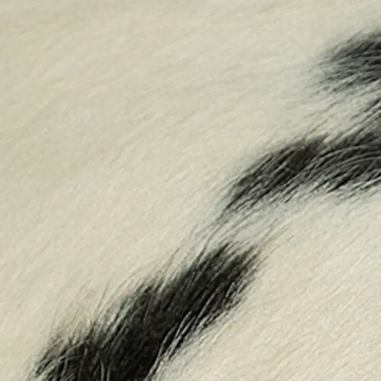 18" White And Black Cowhide Throw Pillow