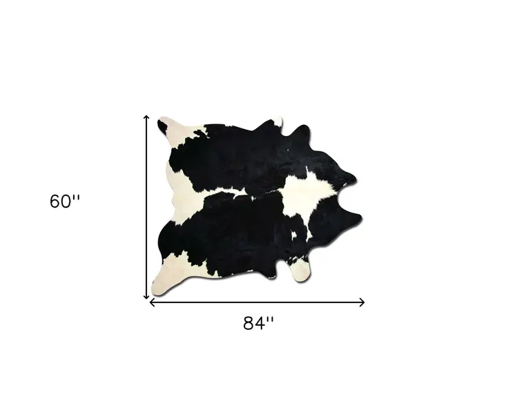 5' X 7' Black And White Cowhide Area Rug