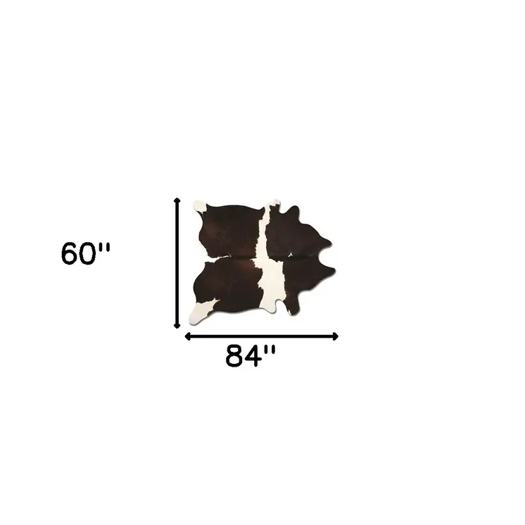 5' X 7' Brown And White Cowhide Cowhide Print Area Rug