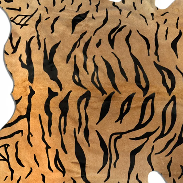 5' X 7' Black And Orange Cowhide Area Rug