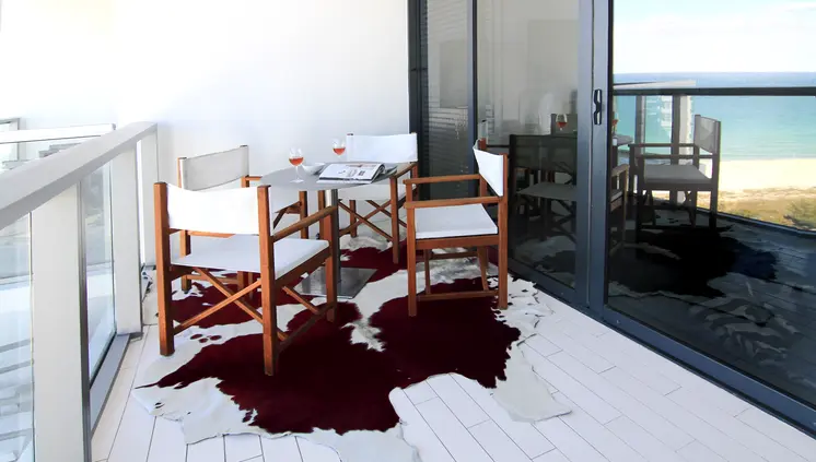5' X 7' Brown And White Cowhide Area Rug
