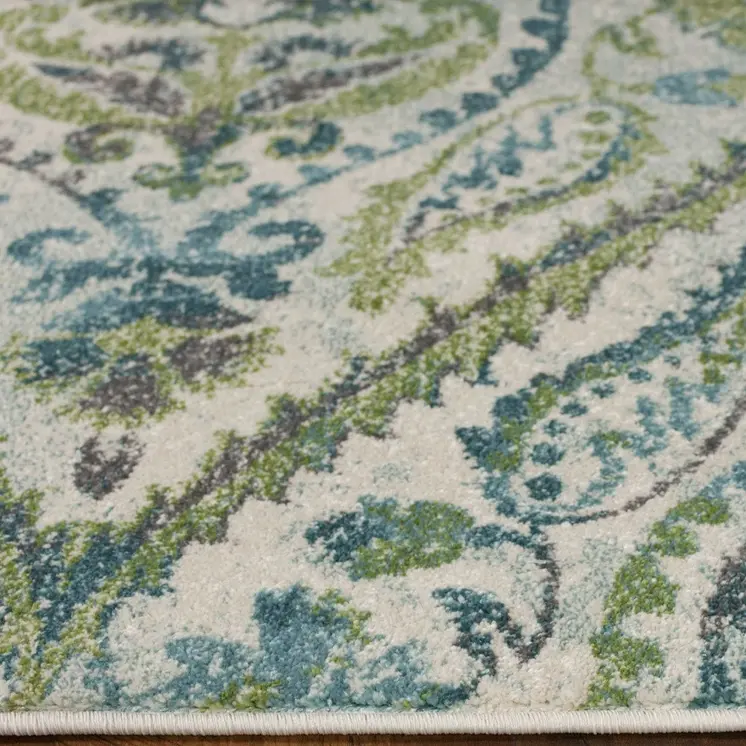7' X 10'  Polypropylene Ivory Or Teal Area Rug