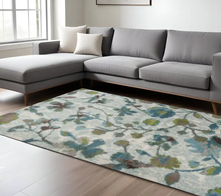 8' X 11' Teal Blue White And Green Floral Area Rug