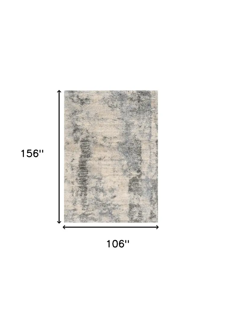 9' X 13' Ivory And Blue Abstract Area Rug