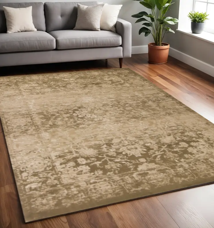 5' X 8' Beige And Tan Floral Distressed Area Rug