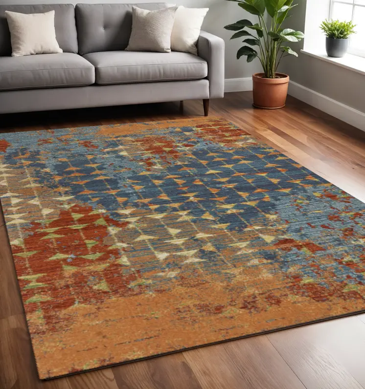 5' X 8' Blue And Coral Abstract Area Rug