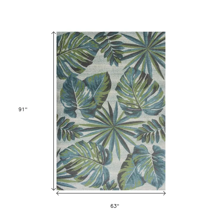 5' X 8' Beige Teal and Green Tropical Botanical Leaves Area Rug