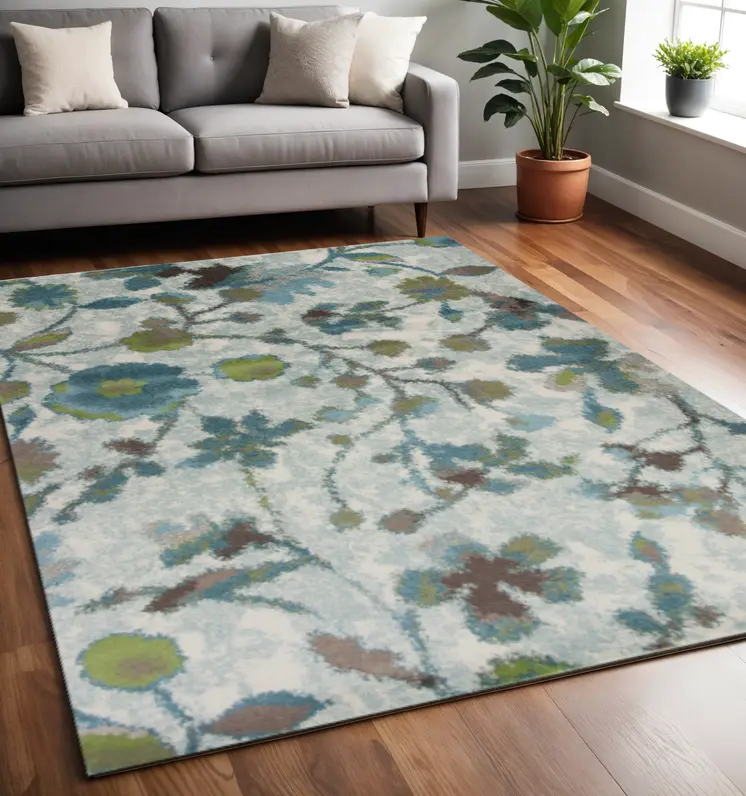 5' X 8' Teal Blue Green And White Floral Area Rug