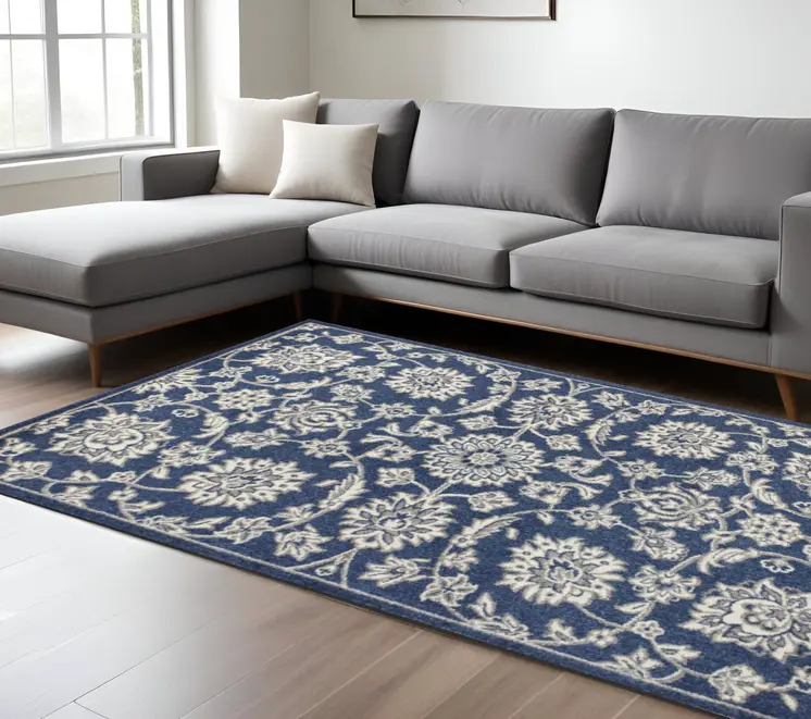 7' X 9' Denim Blue And Ivory Floral Area Rug