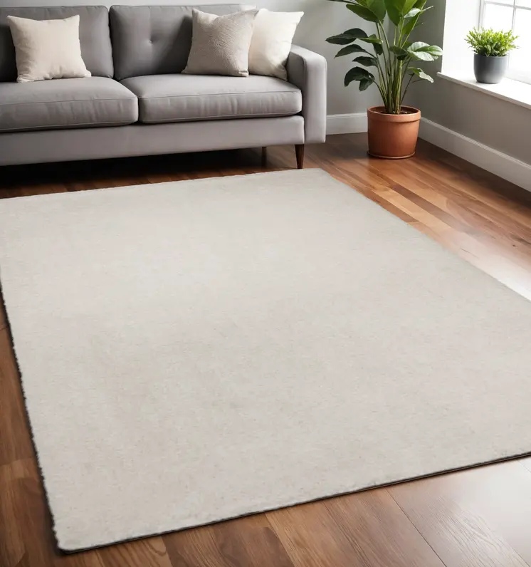 5' X 7' Ivory Shag Hand Woven Area Rug