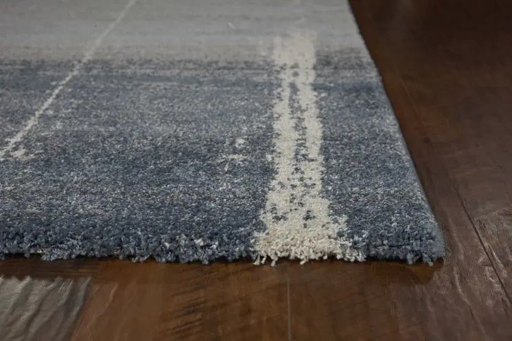 5' X 8' Blue And Gray Abstract Area Rug