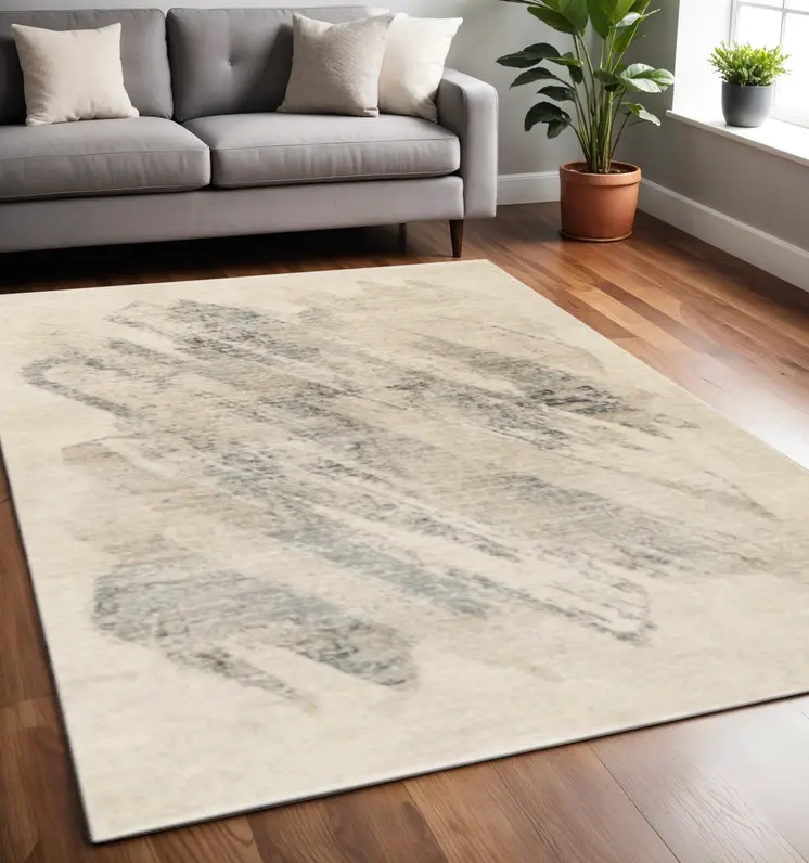 5' X 8' Ivory And Gray Abstract Area Rug