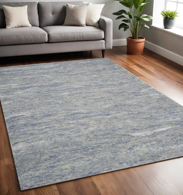 5' X 7' Blue And Tan Abstract Hand Tufted Area Rug