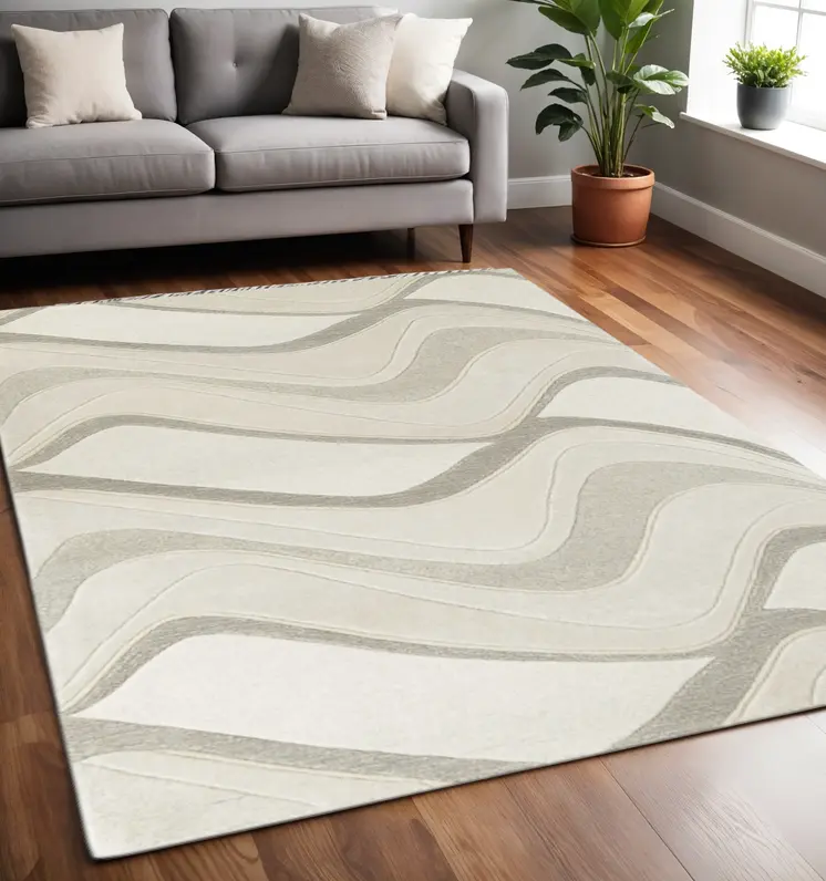 5' X 8' Ivory And Gray Wool Abstract Hand Tufted Area Rug