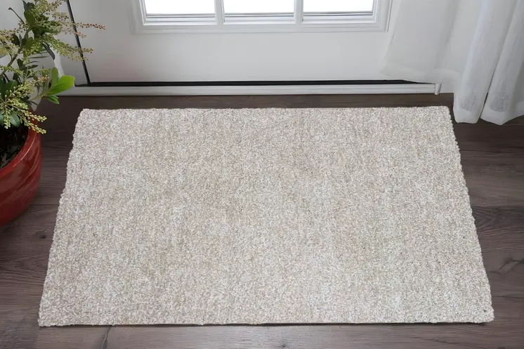 2' X 4' Ivory Shag Hand Woven Area Rug