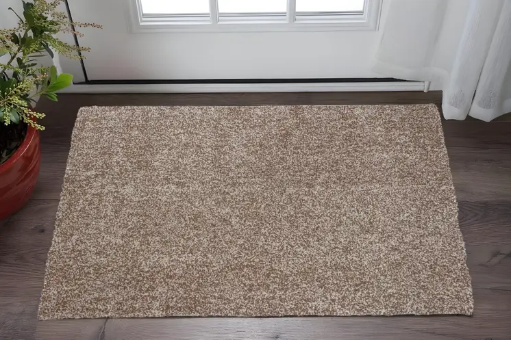 2' X 4' Beige Shag Hand Woven Area Rug