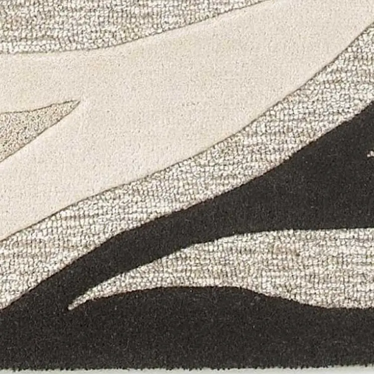 2' X 4' Beige Ivory And Black Wool Abstract Hand Tufted Area Rug