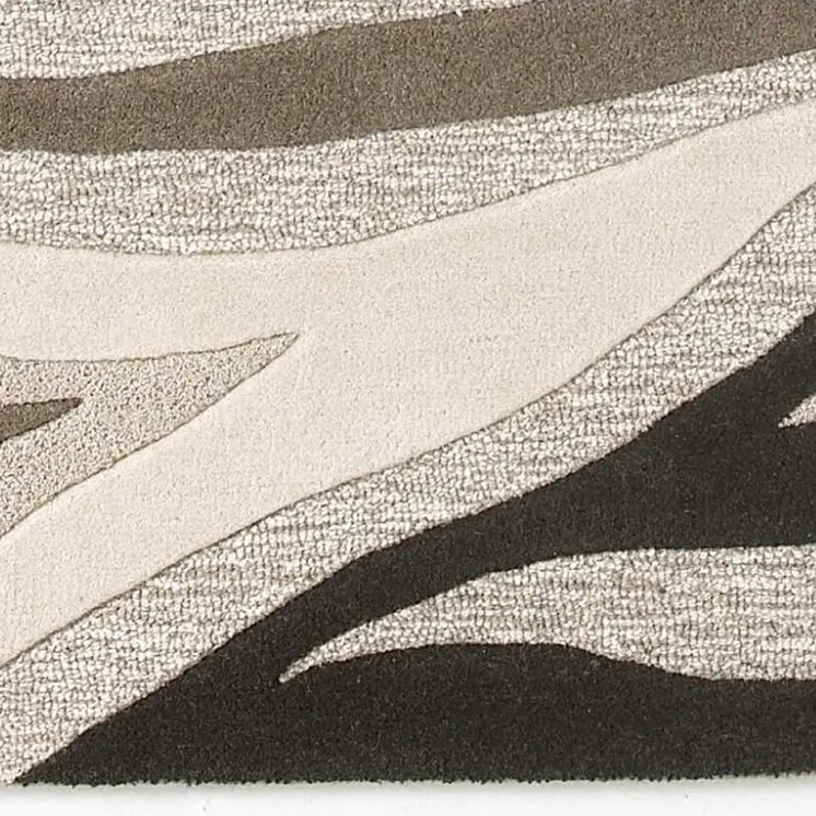 2' X 4' Beige Ivory And Black Wool Abstract Hand Tufted Area Rug