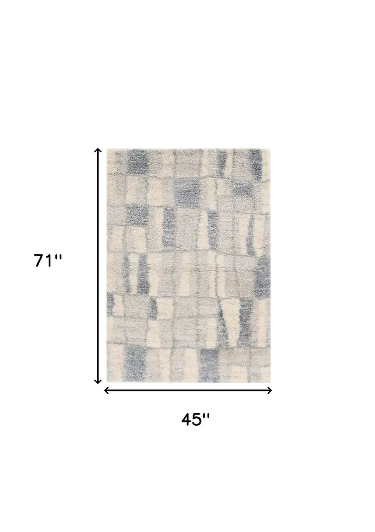 4' X 6' Ivory And Blue Abstract Distressed Area Rug