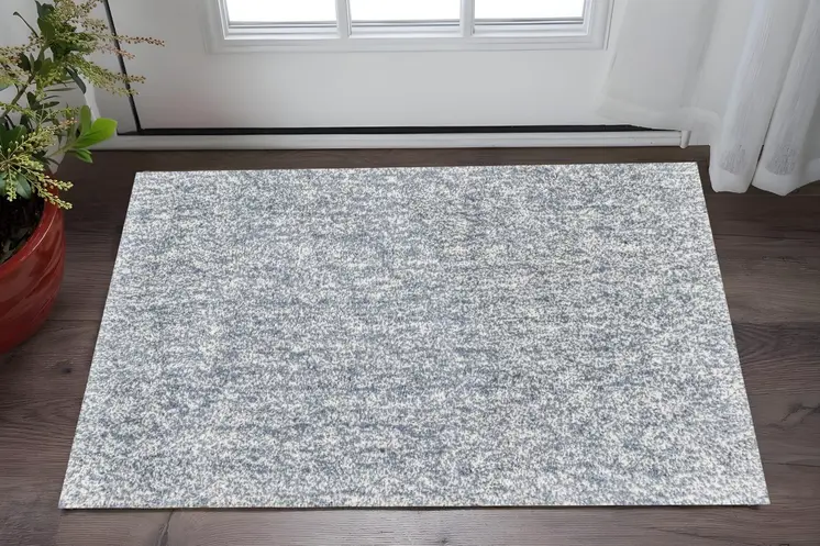 3' X 5' Slate Blue And Ivory Shag Hand Woven Area Rug