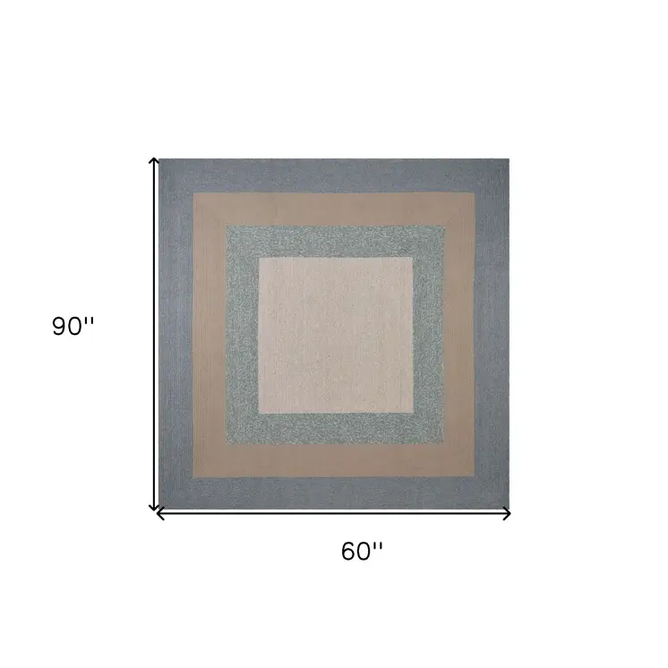 5' X 8' Tan Ivory and Blue Geometric Hand Tufted Area Rug