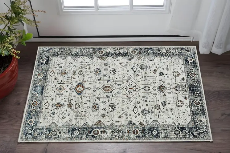 3' X 5' Gray and Ivory Floral Distressed Area Rug