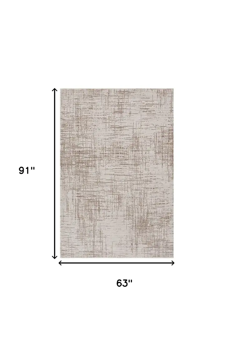 5' X 8' Beige And Tan Abstract Distressed Area Rug