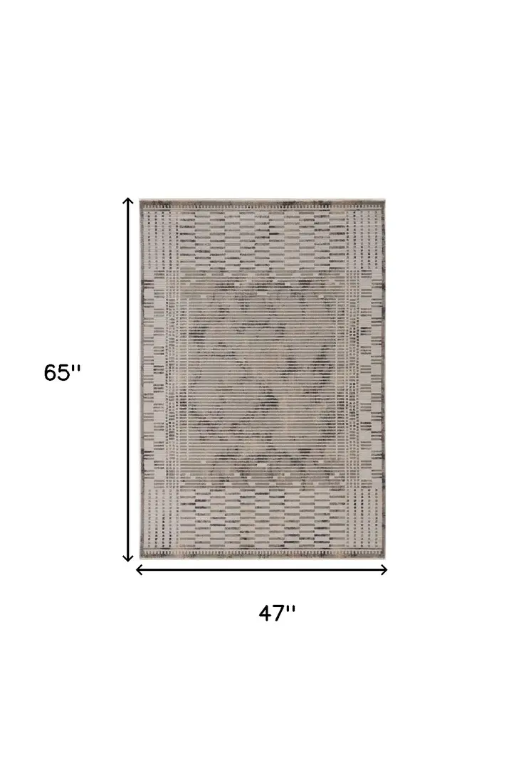 4' X 6' Beige And Ivory Abstract Area Rug