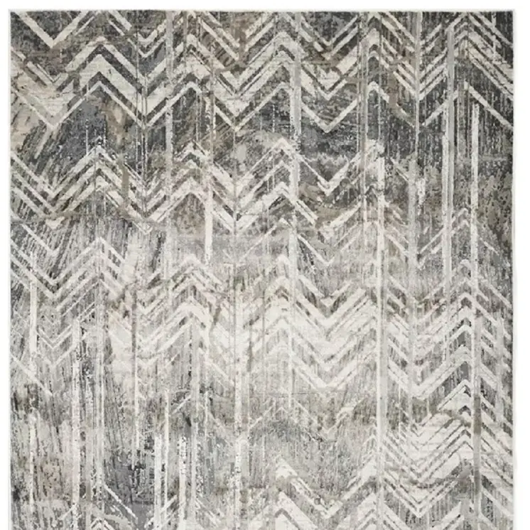 9' X 13' Dark Gray And Ivory Chevron Area Rug