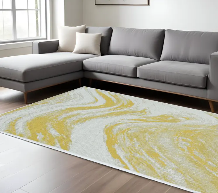 8' X 11' Ivory And Gold Abstract Area Rug