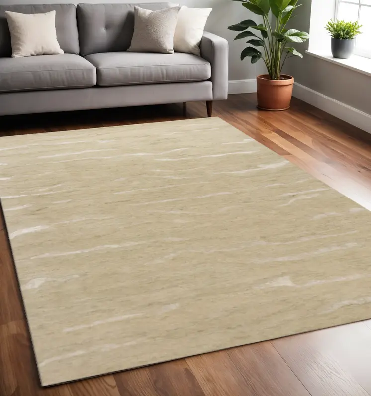 5' X 7' Beige And Ivory Abstract Hand Tufted Area Rug