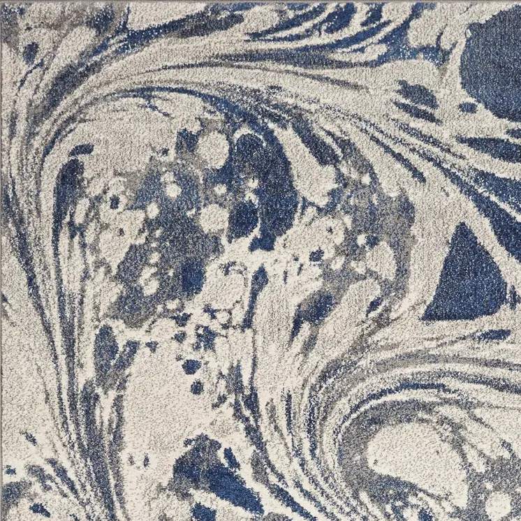 7' X 9' Ivory Blue And Gray Abstract Area Rug
