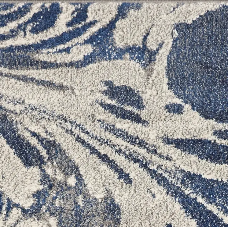 7' X 9' Ivory Blue And Gray Abstract Area Rug