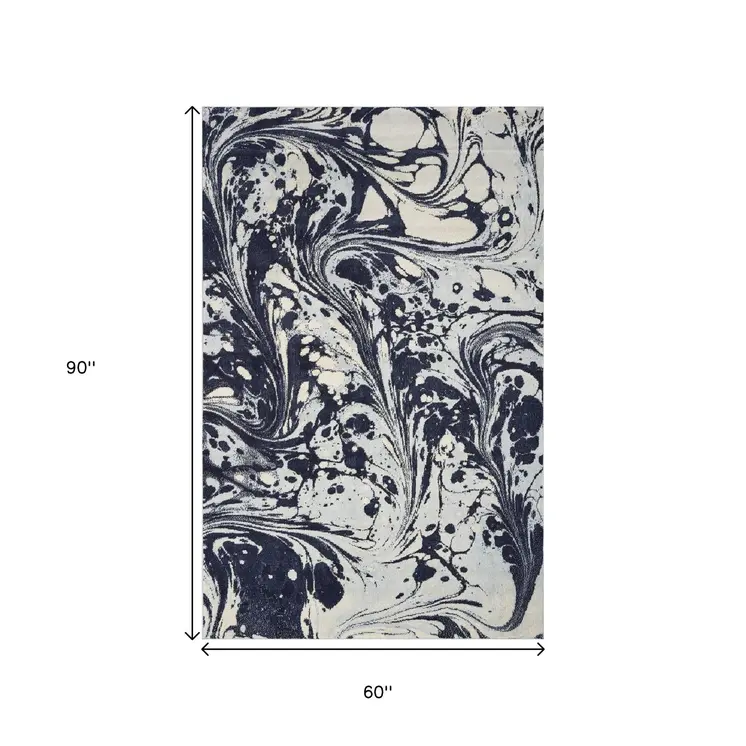 5' X 7' Blue And Ivory Abstract Area Rug