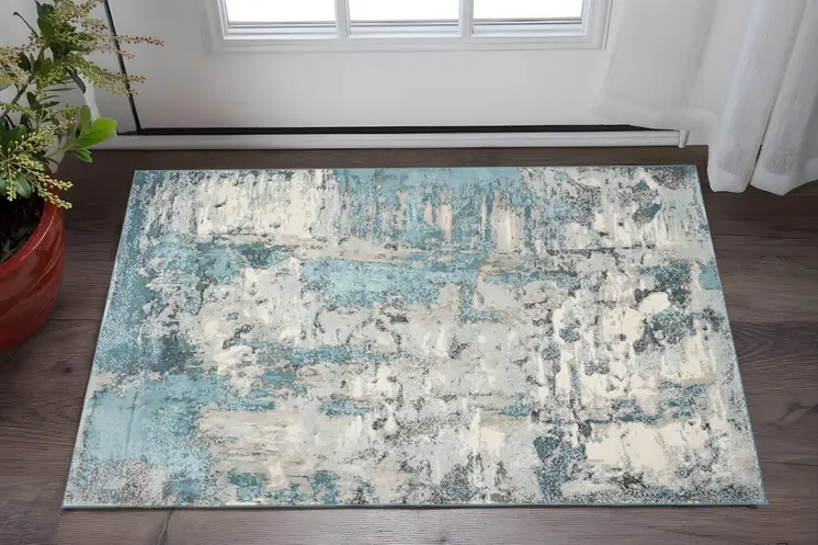 3' X 5' Ivory And Teal Abstract Area Rug