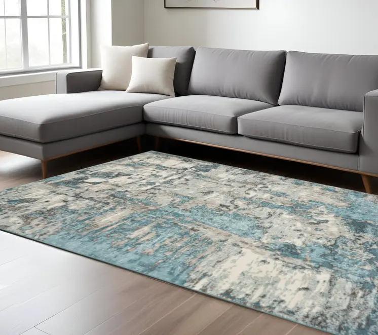 7' X 9' Ivory And Teal Abstract Area Rug