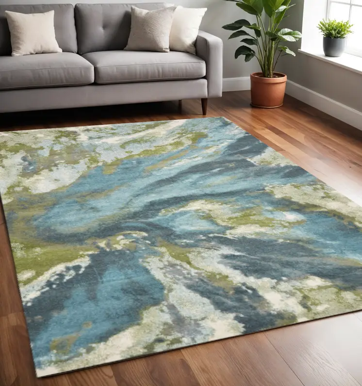 5' X 7' Teal And Beige Abstract Area Rug