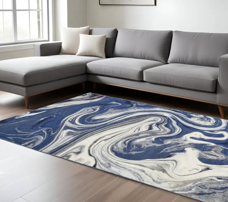 7' X 10' Blue And Beige Abstract Area Rug