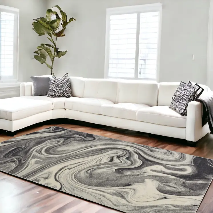 7' X 9' Ivory Black And Gray Abstract Shag Area Rug
