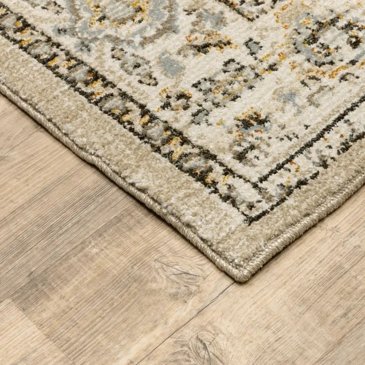 7' X 9' Beige And Ivory Center Jewel Area Rug