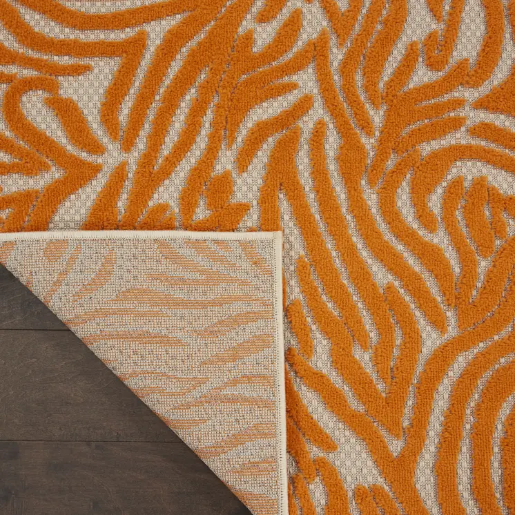 3' X 4' Orange And Ivory Abstract Indoor Outdoor Area Rug