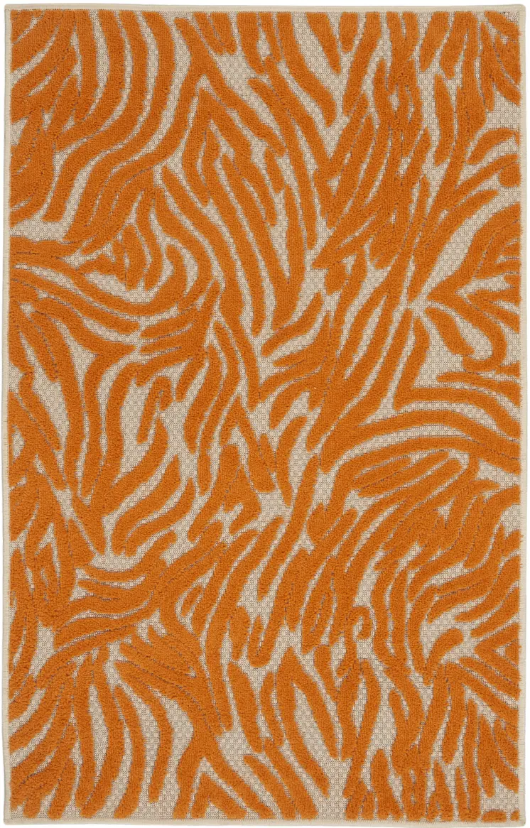 3' X 4' Orange And Ivory Abstract Indoor Outdoor Area Rug