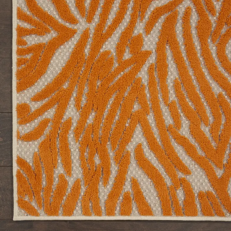 3' X 4' Orange And Ivory Abstract Indoor Outdoor Area Rug