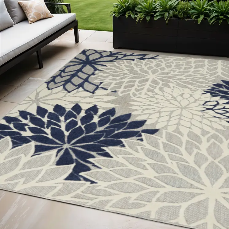 5' X 8' Ivory And Blue Floral Indoor Outdoor Area Rug